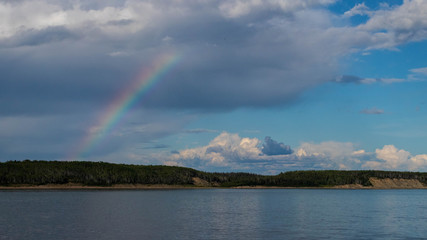 Naklejka na ściany i meble rainbow over lake