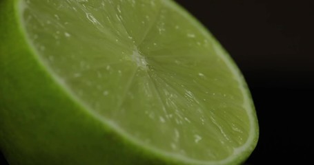 Delicious lime cut for squeezing fresh juice. Lime half
