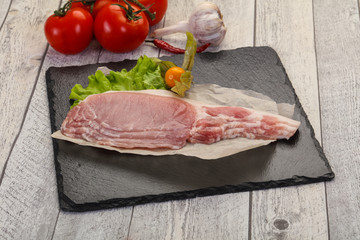 Raw pork bacon