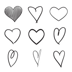 Set of hand drawn abstract hearts on isolated white background. Black and white illustration. Sketchy elements for design