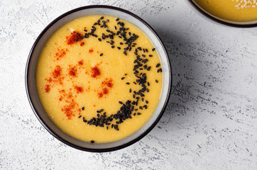 Lentil soup with paprika, sesame and pumpkin seeds