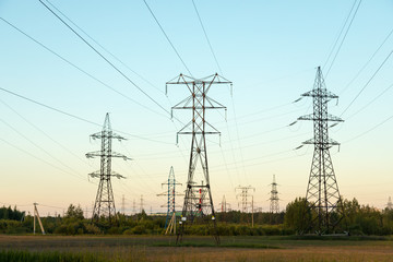 electricity pylons at sunset