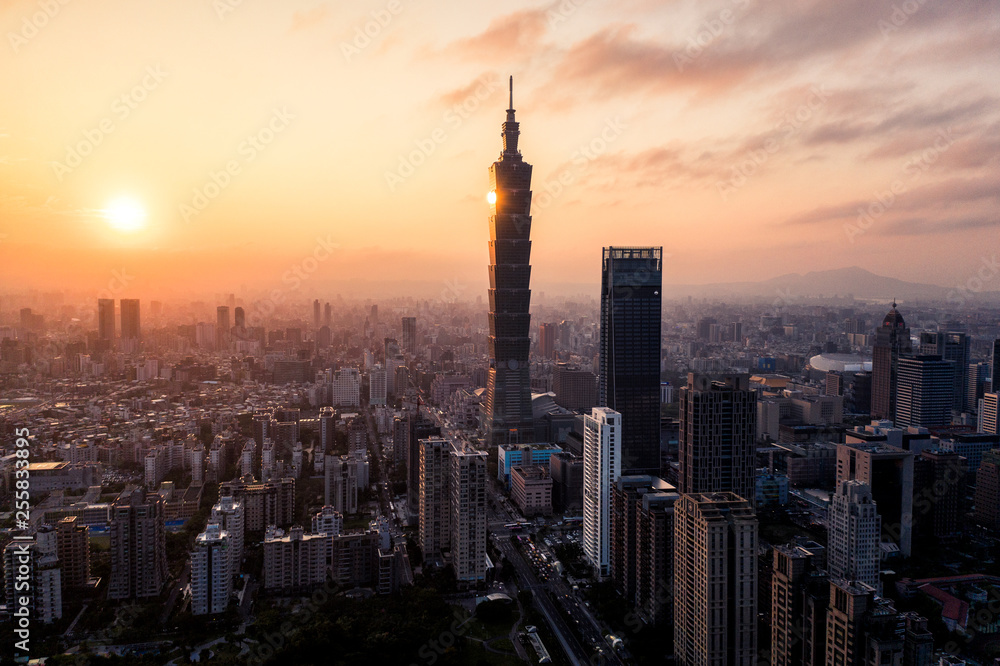 Poster Aerial drone photo - Sunset over Taipei skyline.  Taiwan.  Taipei 101 skyscraper featured.  