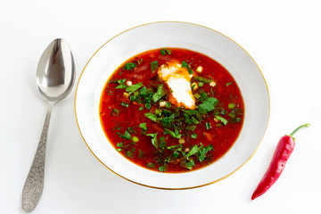tomato soup in a bowl isolated on white