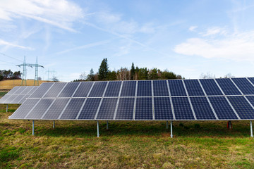 Solar Power Station on the early spring Meadow 