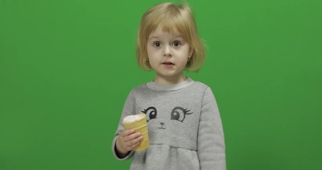 Kid girl with ice cream on a Green Screen, Chroma Key