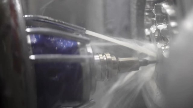 Closeup view at carving process in dental milling machine