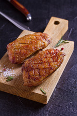 Duck breast, lavender honey and rosemary, served on chopping board