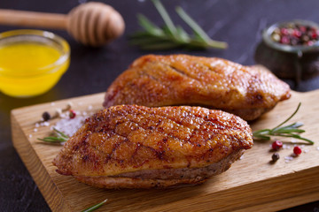 Duck breast, lavender honey and rosemary, served on chopping board