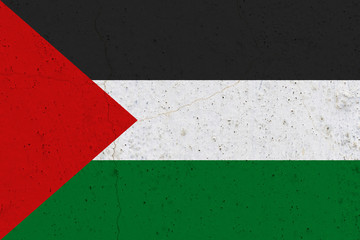 palestine flag on concrete wall
