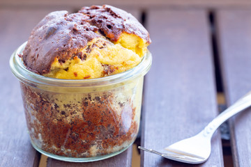 Homemade vegan chocolate cheesecake muffins baked in a jar