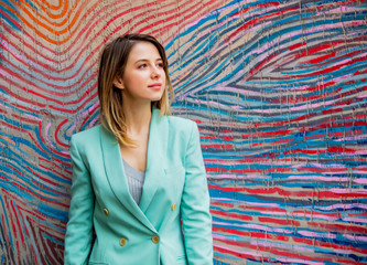 Young woman in Blazer of 90s style