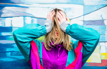 Young woman in jacket of 90s style