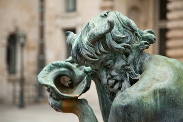 bronze statue at the fountain of town hall hamburg germany