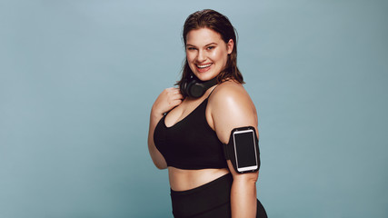 Overwight young woman in sportswear