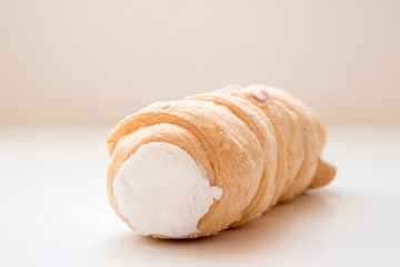 A kremrole or cream roll. A traditional pastry dessert tube filled with cream or meringue and...