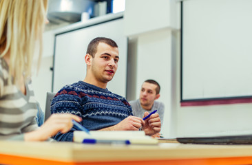 Students interacting on class