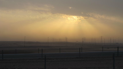 sunlight burst through clouds
