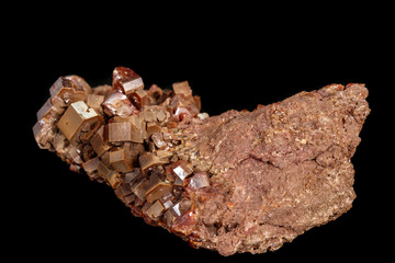Macro mineral stone Vanadinite on a black background