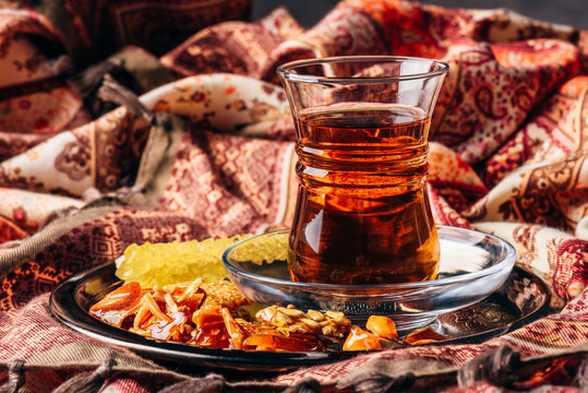 Tea in armudu with oriental delights and crystal sugar