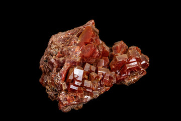 Macro mineral stone Vanadinite on a black background