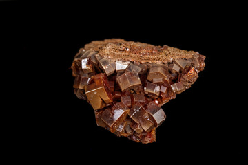Macro mineral stone Vanadinite on a black background
