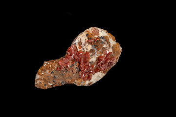 Macro mineral stone Vanadinite on a black background