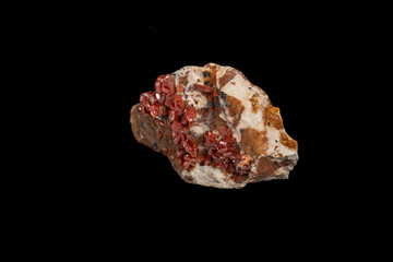 Macro mineral stone Vanadinite on a black background