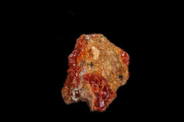 Macro mineral stone Vanadinite on a black background