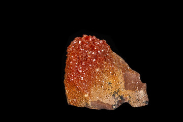 Macro mineral stone Vanadinite on a black background