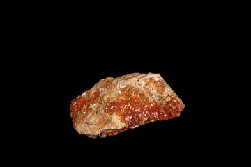 Macro mineral stone Vanadinite on a black background