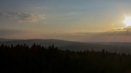 Obraz premium great sunset view over the forest in bavaria