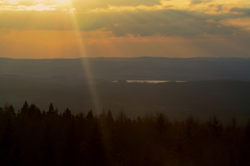 big sunset view over the forest in bavaria