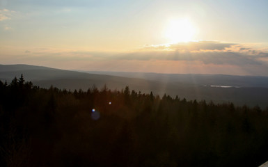 great sunset view over the forest in bavaria