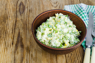 Salad with egg and green onions, vegetarian dishes.