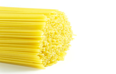 Yellow long spaghetti isolated on white background, Blank for design, food concept..