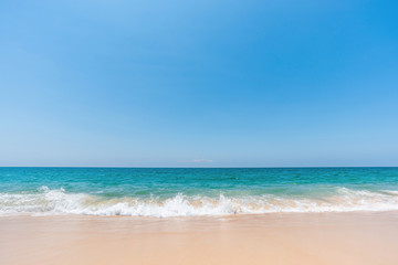 Fototapeta na wymiar sea wave on sand beach and scenic natural seascape background