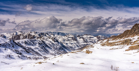 snowy mountains panorama in ski resort isola 2000, france