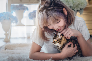 portrait of Asian female with cute cat