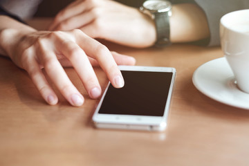 Business woman hands with smart phone and cup of coffee. For Graphic display montage.
