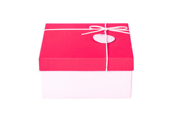 Red gift box with ribbon isolated on white