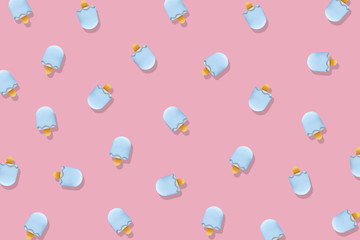 White Ice Cream Isolated on Pastel Pink Background. Eraser in Shape of Ice-Cream Dessert, Summer Minimalism. Abstract Bright Ice Cream Sticks Food Pattern on Pink Texture, Copy Space Top View.