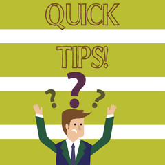 Word writing text Quick Tips. Business photo showcasing small but particularly useful piece of practical advice Confused Businessman Raising Both Arms with Question Marks Above his Head