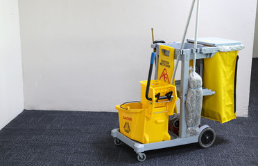 Closeup of janitorial, cleaning equipment and tools for floor cleaning at the airport. 