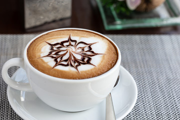 Close shots, hot coffee in a white cup