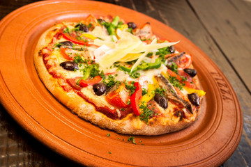 Hot and fresh pizza with cheese slides