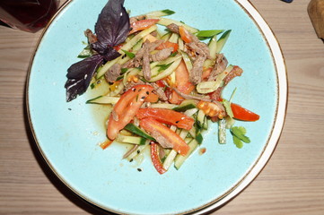 spicy vegetable salad with boiled meat