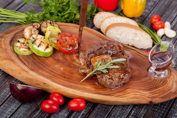  juicy and appetizing steak tamogavok of horse meat on the table, for design in cooking