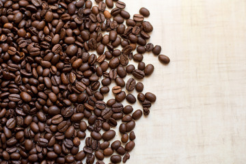 Coffee beans isolated on light background with place for text