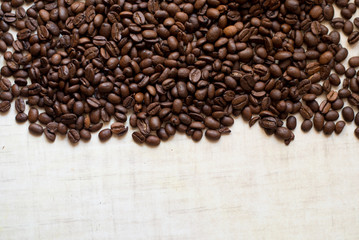 Coffee beans isolated on light background with place for text